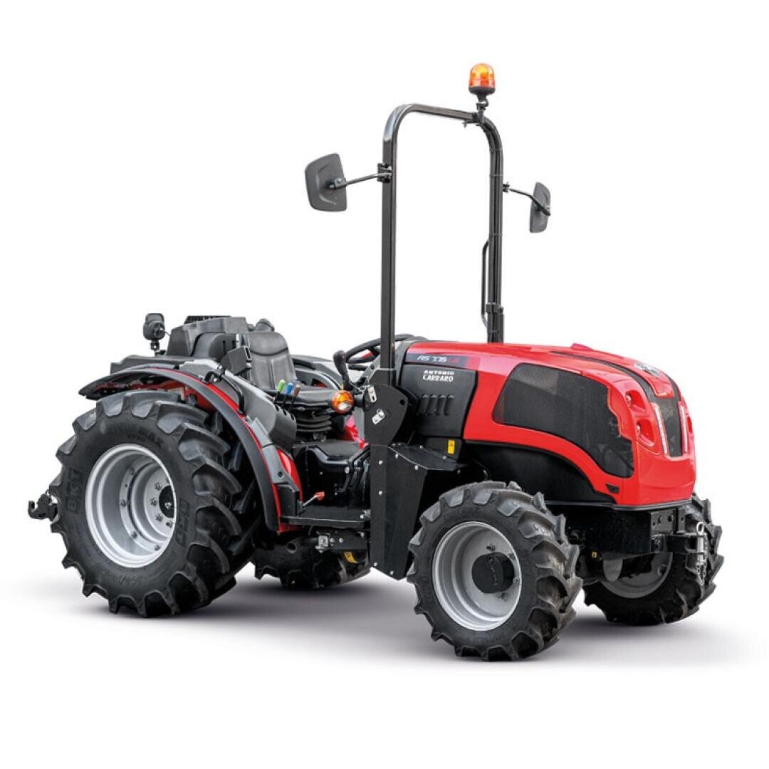 A small red tractor with large rear tires, smaller front tires, open driver's cab, side mirrors and an orange warning light on the roof, shown against a white background.