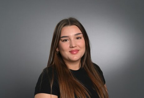 A young woman with straight brown hair
